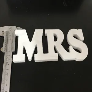 White wooden MRS letter detail shot, showing thickness and craft, ideal for wedding decor.