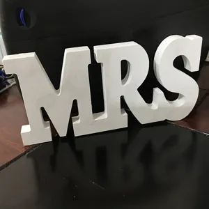 White wooden MRS letter decor detail, perfect for wedding photography and home display.
