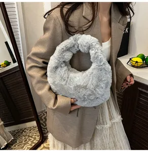 Chic grey faux fur handbag for women, soft plush top handle bag, stylish winter fashion accessory.