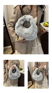 Detailed view of the soft grey faux fur handbag, showcasing its plush texture and rounded handle.
