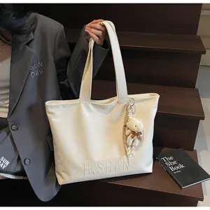 Large capacity beige tote bag for women, stylish shoulder bag for daily work and casual use.