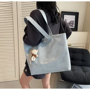 Casual blue tote bag for women, large capacity shoulder bag for commuting daily use.