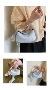 Detail shot of the women woven dumpling handbag, showcasing the elegant intrecciato texture and charm.