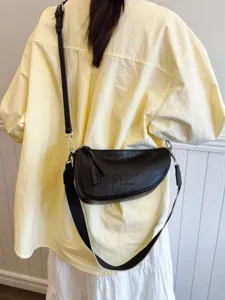 Dames retro crossbody zadeljas, casual Koreaanse stijl dumpling tas, stijlvol zwart PU-lederen tas.