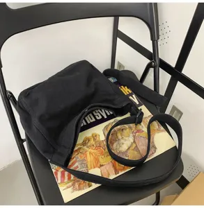 Μαύρη casual καμβάς dumpling τσάντα ώμου, ευέλικτη crossbody τσάντα για καθημερινή χρήση.