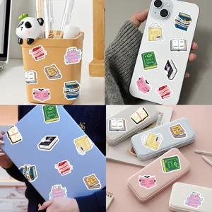 Detailed view of waterproof bookish aesthetic stickers displayed on laptop and phone case.