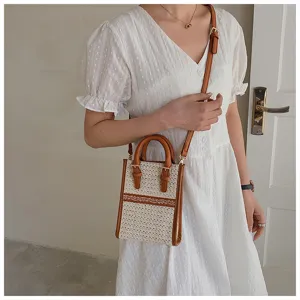 Woven crossbody phone bag for women, summer stylish small handbag with brown leather trim details.