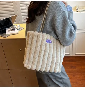 Plush shoulder bag for women, large capacity fluffy tote handbag for daily commuting and college.