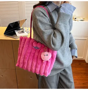 Pink fluffy tote bag for women, large capacity plush shoulder bag for daily commute and school.