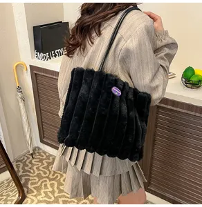 Black plush tote bag for women, large fluffy shoulder bag for daily commuting and school use.