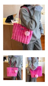 Pink fluffy plush shoulder tote bag with vertical stripes and cute furry ball pendant, detail view.