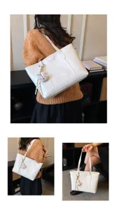 Minimalist large capacity tote bag for women, stylish shoulder bag for daily commute and work.