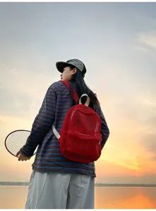 Red mesh backpack women summer outdoor lightweight travel breathable casual daily use detail view.