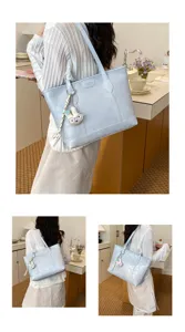 Large capacity PU leather tote bag for women commuting, stylish casual shoulder bag.