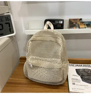 Beige mesh backpack, breathable summer travel daypack, lightweight beach bag for use style.