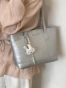 Stylish large capacity metallic tote shoulder bag for women commuting and daily use.