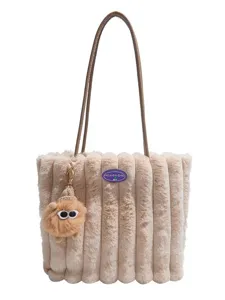 Fluffy plush tote bag for women, large capacity shoulder handbag with cute furry pendant.