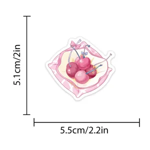 Close-up detail van de schattige roze kersen sticker met strik en duidelijke maatvoering.