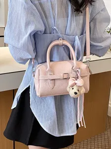 Borsa a mano bowling in pelle rosa grana litchi da donna, chic borsa Boston con ciondolo.