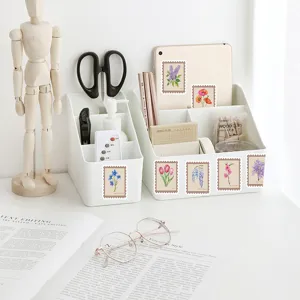 Detail view of retro floral stamp stickers displayed neatly on desktop organizers.