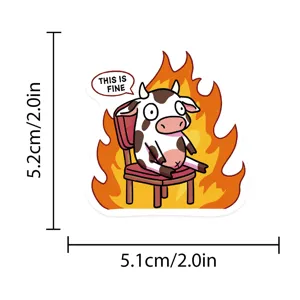 Waterproof vinyl sticker featuring a funny cow in fire meme design, durable laptop and luggage dec.
