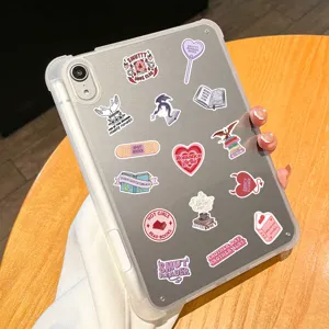Close-up detail of bookish aesthetic vinyl waterproof stickers on a clear tablet case.