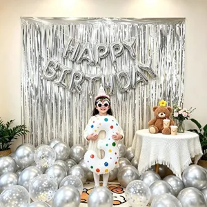 Birthday party balloon decoration set with silver fringe curtain and foil number balloons