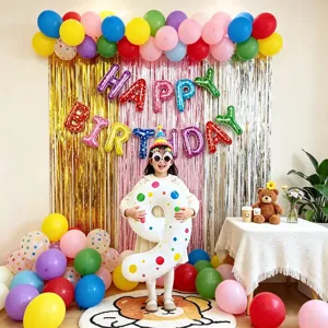 Birthday party decoration set with colorful balloons, number 9 foil balloon and tinsel curtain