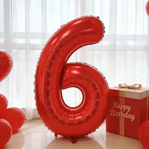 Red number 6 foil balloon for birthday party decorations, indoor celebration layout setup.