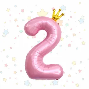 Close-up of the 40-inch pink number 2 foil balloon featuring a cute little gold crown.