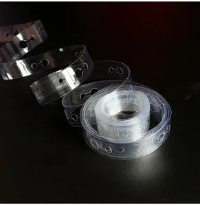 Clear plastic balloon strip detail showing dual holes for easy arch decoration setup.