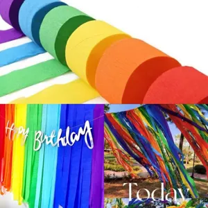 Rainbow crepe paper streamers for party background wall decoration, colorful DIY paper rolls.