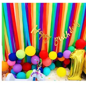 Colorful crepe paper streamers fringe backdrop for birthday party and wall decoration rolls.