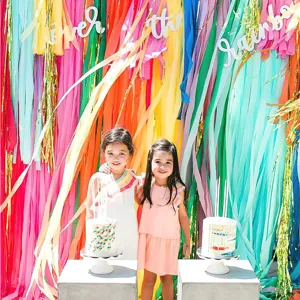 Detailed scene of colorful crepe paper streamers backdrop for party and wall decoration.
