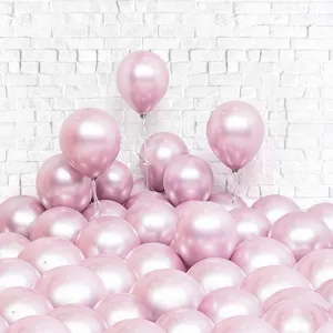 Detail shot of metallic pink balloons cluster for birthday party and celebration decor.