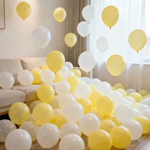 Detailed view of yellow and white macaron balloons set for party room decoration