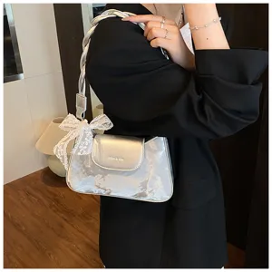 Sac à épaule argenté pour femme, sac sous bras chic avec poignée tressée et nœud en dentelle.