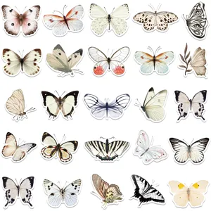Watercolor butterfly stickers detail, showing various colorful insect designs for journaling.