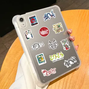 Transparent tablet protective case decorated with various cute dragon year stickers.