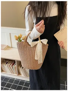 Borsa a mano in paglia stile francese con elegante fiocco in pizzo, borsa da spiaggia.