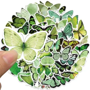 Green butterfly stickers detail shot, decorative waterproof decal for laptop, luggage, guitar.
