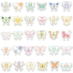 Detailed view of colorful cartoon butterfly stickers, perfect for decorating laptops and cases.