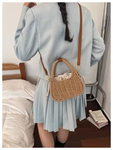 Chique zomerse geweven stro handtas voor dames, trendy kleine emmertas met schouderband.