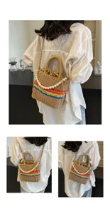 Stylish straw woven bucket bag featuring colorful stripes and elegant pearl chain strap for women.