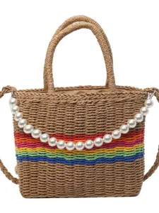 Chic straw woven handbag with pearl chain and colorful stripes, ideal for summer.
