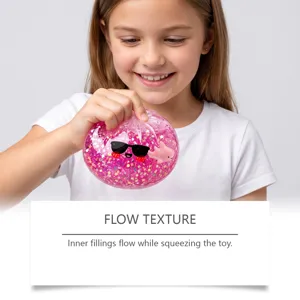 Juguete antiestrés rosa con purpurina, cara de gafas de sol y axolotl para aliviar la tensión.