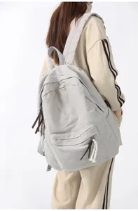 Sac a dos en toile uni minimaliste pour femme, style college decontracté cartable voyage gris.