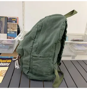 Détail de sac à dos en toile verte, sac d'école décontracté pour femmes et voyages