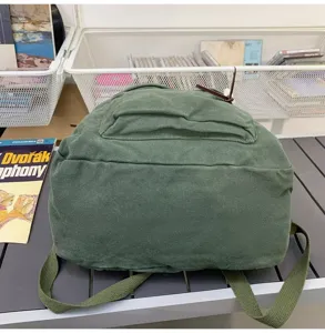 Sac à dos en toile unie, cartable de style décontracté pour les voyages et l'école.