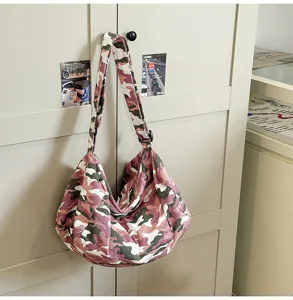 Pink camo canvas shoulder bag, casual large capacity crossbody bag for daily commute and school.